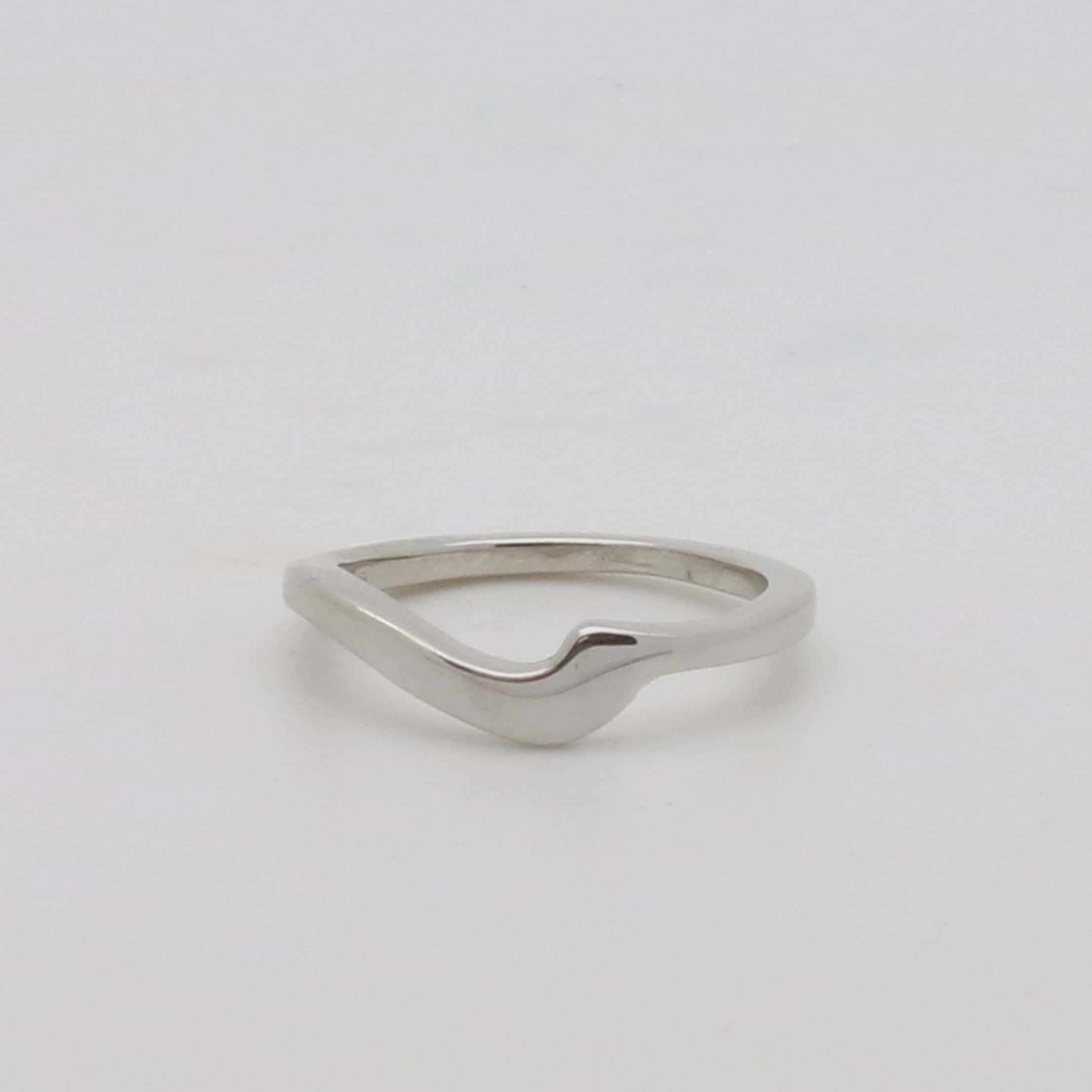 White gold bespoke shaped wedding ring
