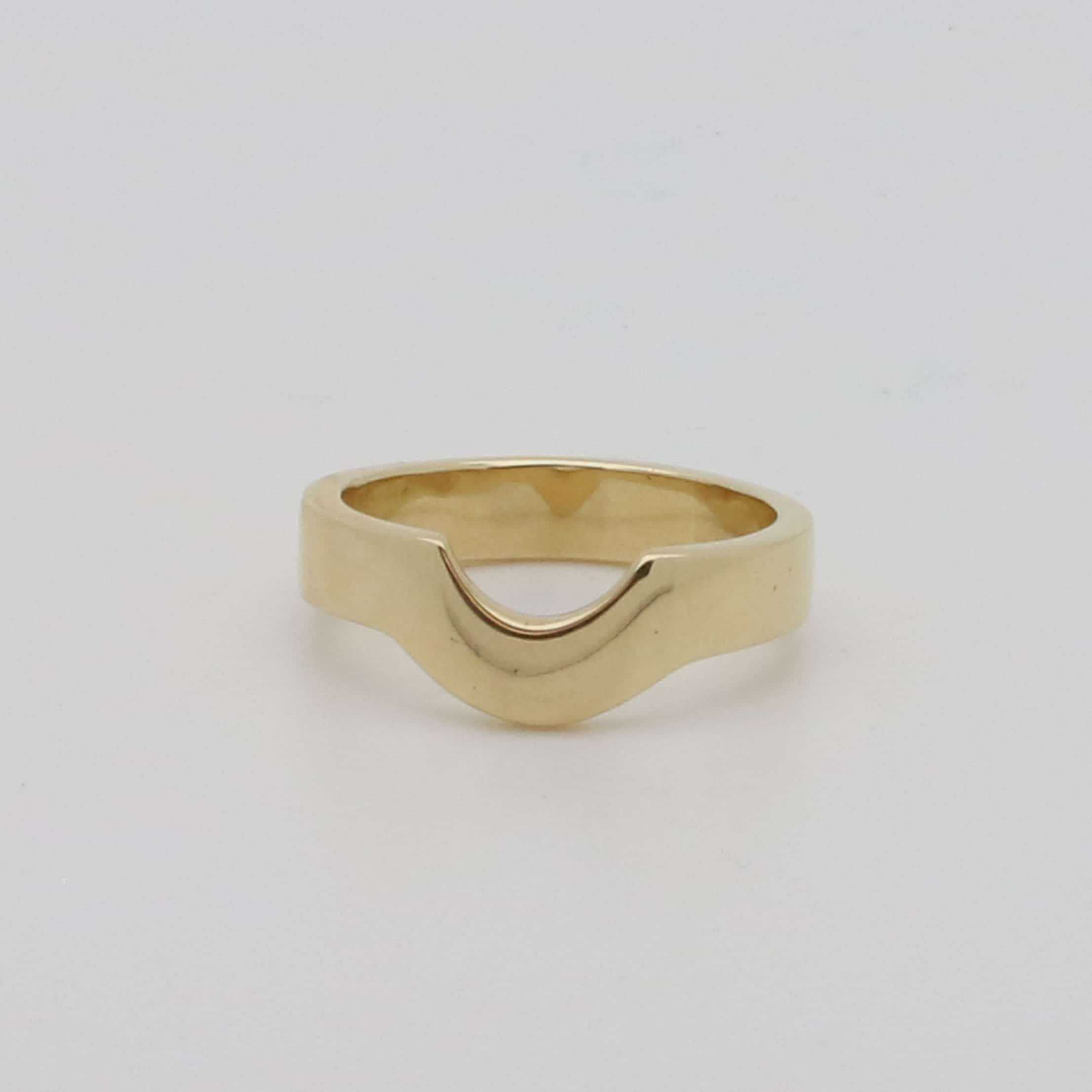 Yellow gold bespoke shaped wedding ring
