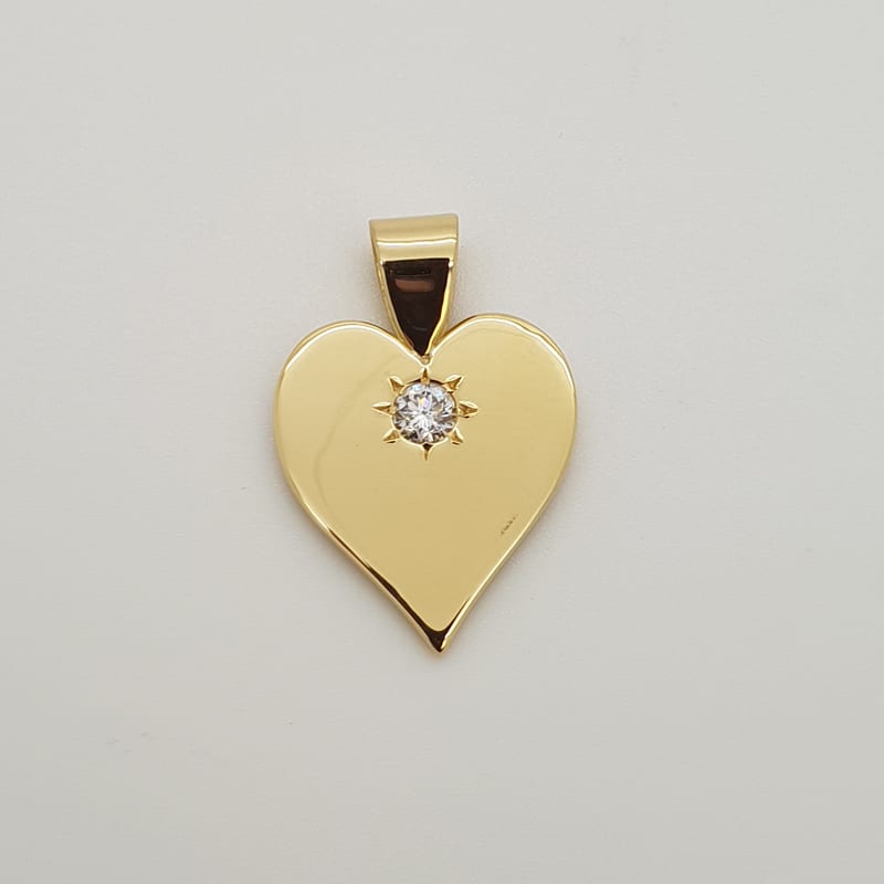 Heart Shaped Pendant set with a Diamond